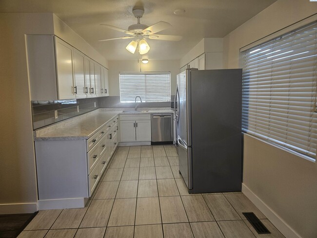 Building Photo - Completely Remodeled Condo; Very Private & Quiet