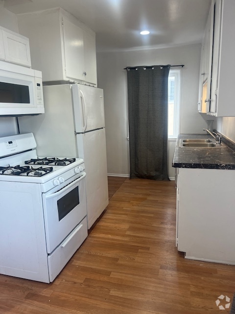 Kitchen w gas range dual stainless sink & refrigerator - 4023 McLaughlin Ave