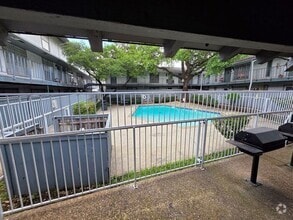 Building Photo - Updated 1-Bedroom Condo Near Pool Ready fo...