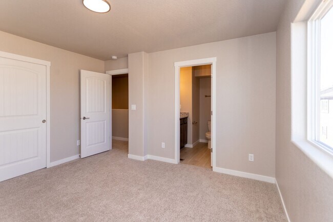 Building Photo - Unveiling Luxury Living: Townhomes with Ma...