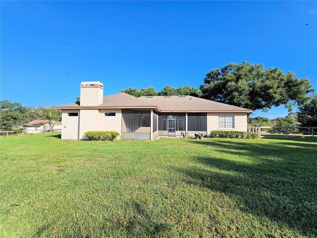 Building Photo - 15404 Thoroughbred Ln