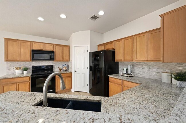 Building Photo - 7817 Squirrel Hollow Dr