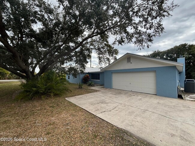 Building Photo - 6335 S Tropical Trail