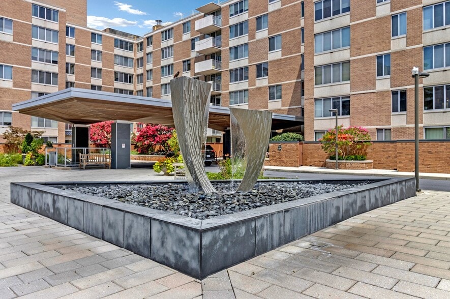 Front entrance with visitor parking - 2939 Van Ness St NW