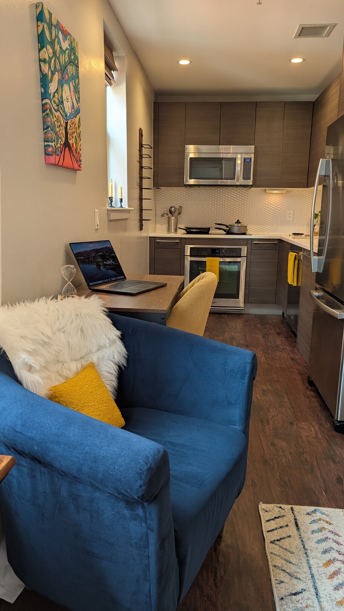 Arm chair, desk and office chair in living room/kitchen - 3606 Rock Creek Church Rd NW