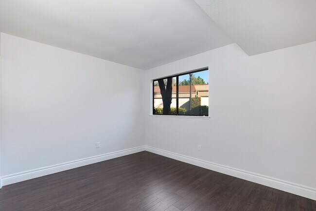 Building Photo - Lake and Golf Course View- Remodeled Condo w/ 2 Car Garage!