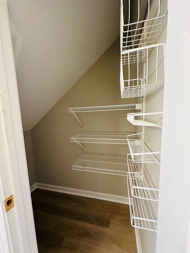 Building Photo - 2 bed, 2.5 bath updated townhouse w/ 1-car garage & Trex deck available now