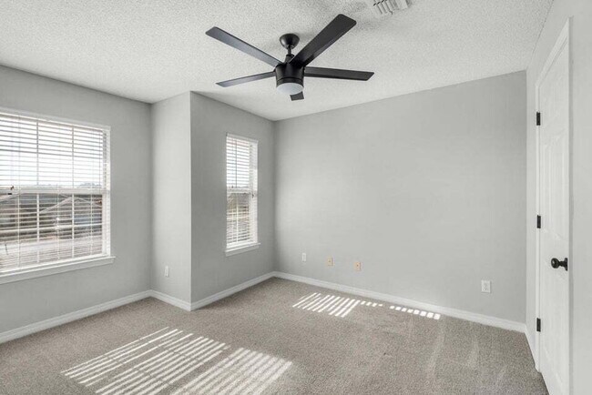 Building Photo - LAKE FRONT HOME & GATED COMMUNITY WITH COMMUNITY POOL IN NAVARRE!