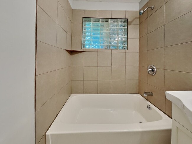 Building Photo - Charming 3-Bedroom Home with Sunroom, Fireplace & Garage in Kansas City, MO!