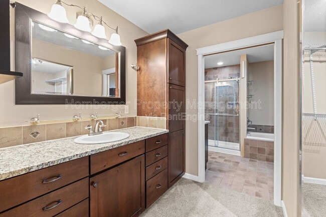 Building Photo - 6929 N Country Homes Blvd