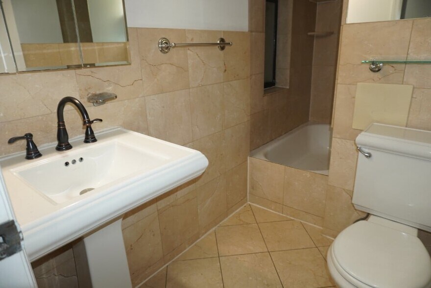 Building Photo - 697 Tenth Ave (47th & 48th Ave), #2FS