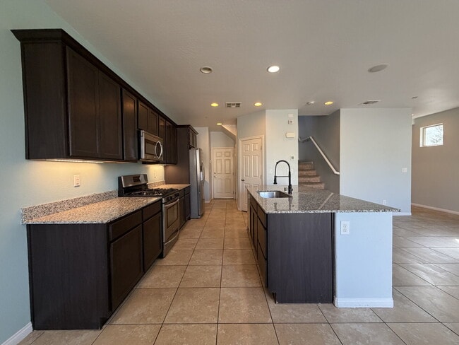 Building Photo - 4 BED 2.5 BATH 2 CAR GARAGE SINGLE FAMILY HOME W/ FULLY LANDSCAPED BACKYARD. THIS WAS FORMER MODE...