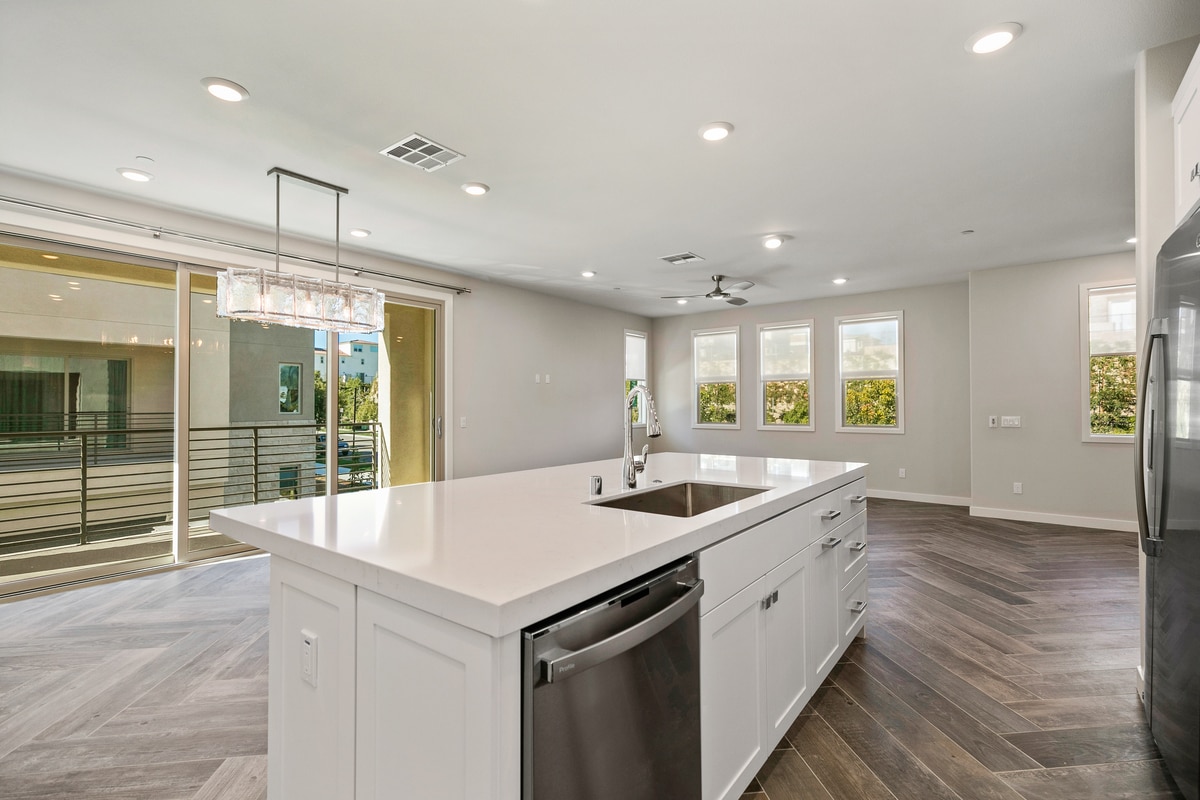 View from kitchen corner to DR and GR - 590 Catalonia