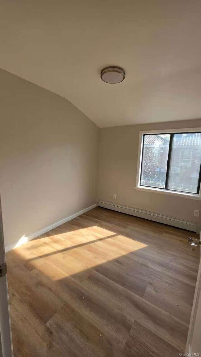 Building Photo - 206-66 46th Ave