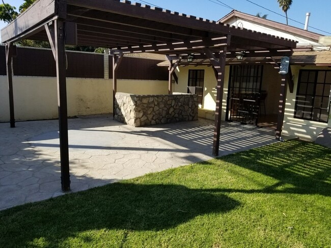 Building Photo - Three Bedroom Home + Detached Studio