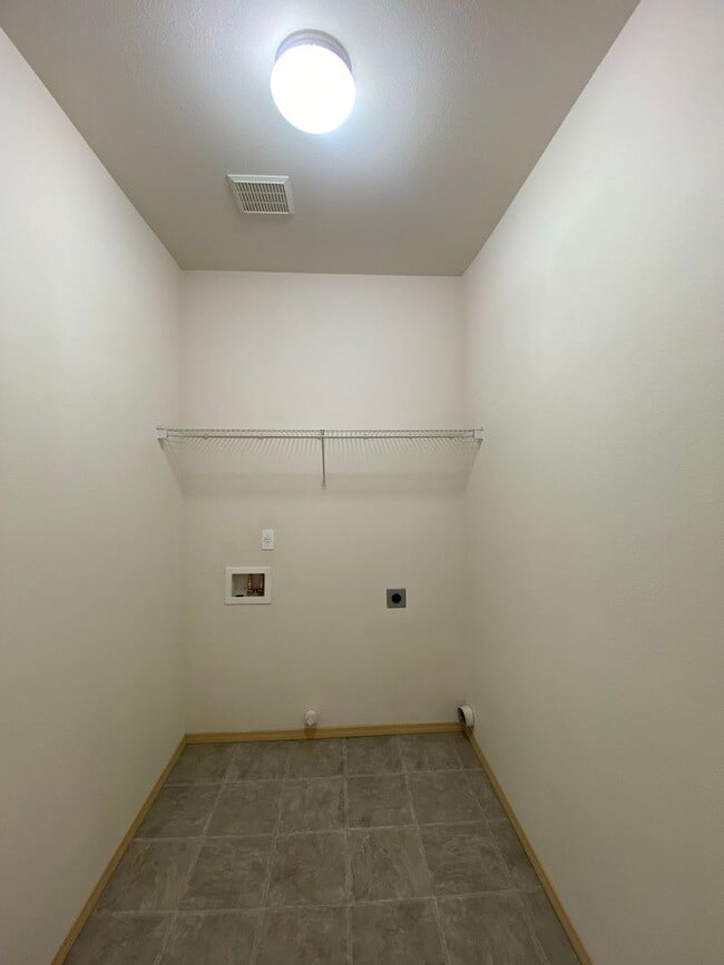 Building Photo - No Mower Needed! Great Townhome In A Beautifully HOA Maintained Community