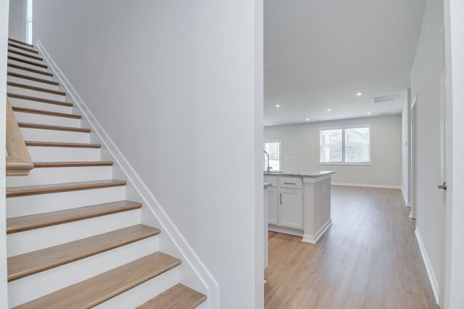 Building Photo - Stunning 4-Bedroom, 3-Bath New Construction Home with Master on Main and Upstairs Retreat