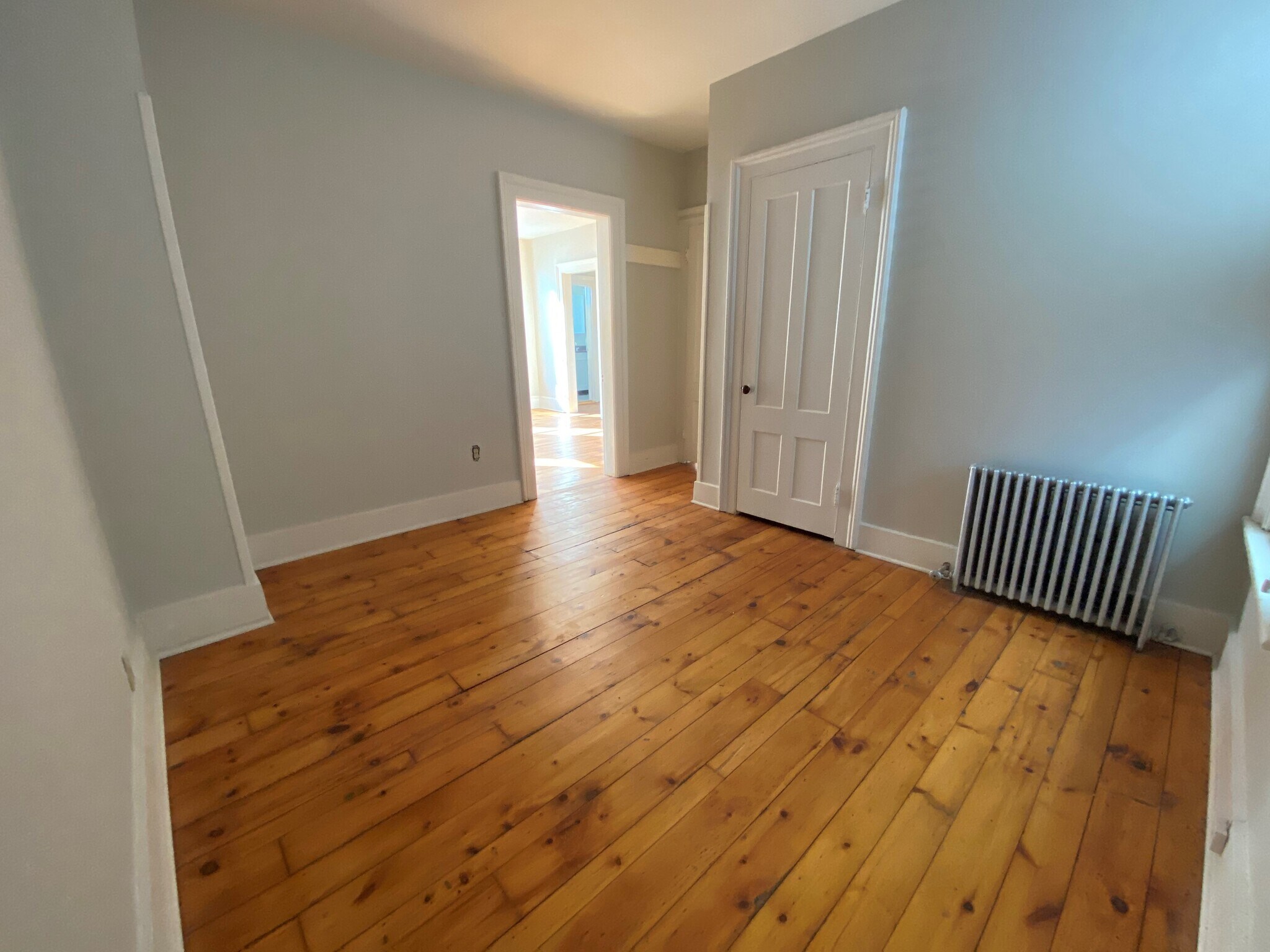 Bedroom #2 features a nice sized closet, new custom cellular blinds, a full-sized bed frame, nightstand, desk & dresser - 55 Pearl St