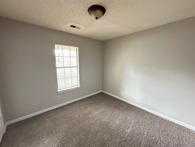 Building Photo - MOVE-IN READY! 3BR/2BA in Quiet Cove | Brick Fireplace | Fenced Yard & Patio!