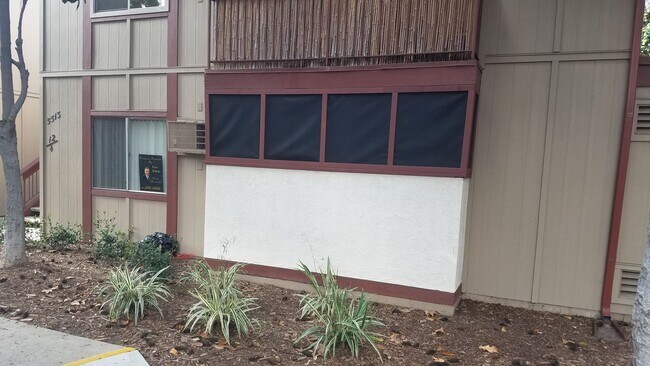 Building Photo - 3 bedroom, 2 bath, ground floor unit, and private patio.