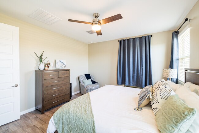 Master bedroom with king bed and blackout shades - 8924 W Solano Dr