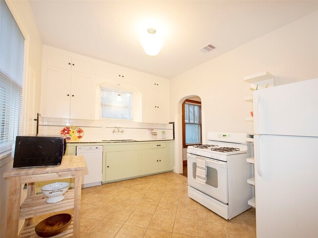 Building Photo - 5111 Ave Q 1/2