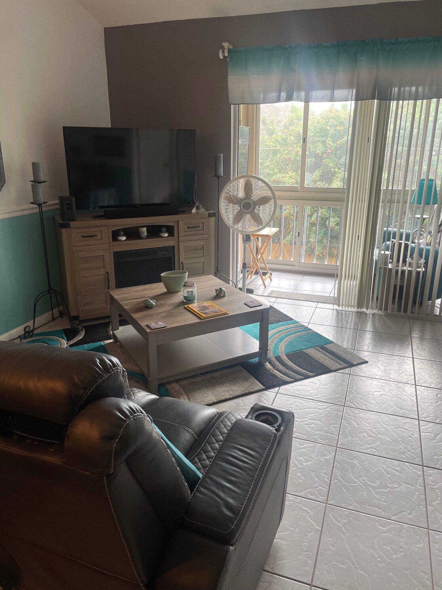 Living Room and Screened in Porch - 6424 Spring Flower Dr