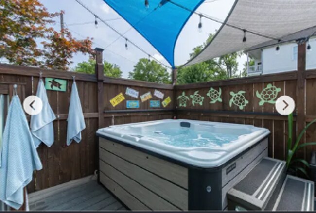 Building Photo - 4 Bedroom with a Hot Tub in the heart of t...