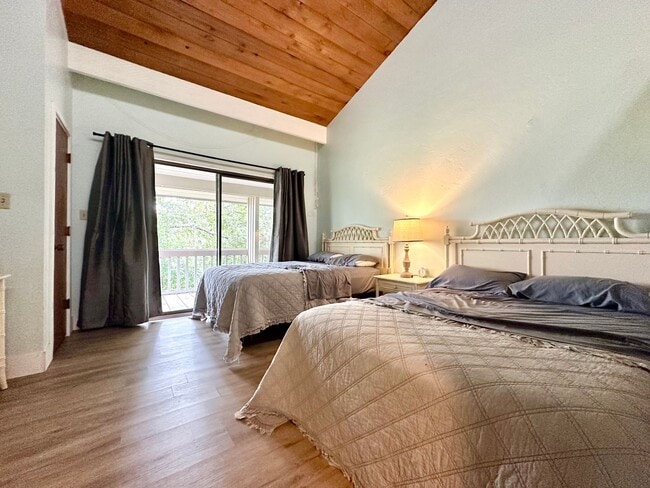 Building Photo - Lofty Vibes & Backyard Views – Your Dream ...