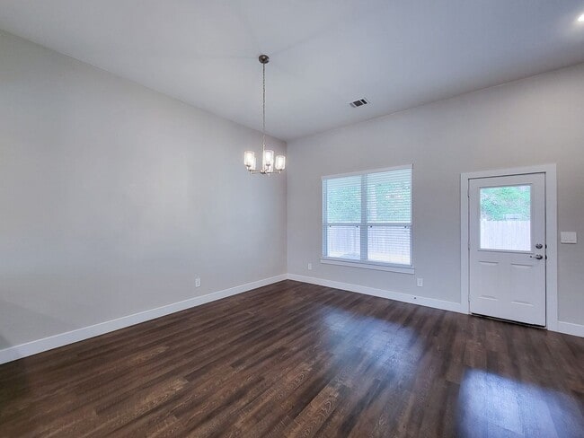 Building Photo - Very functional floor plan, has game room/home office, covered back patio on a big lot. Primary o...