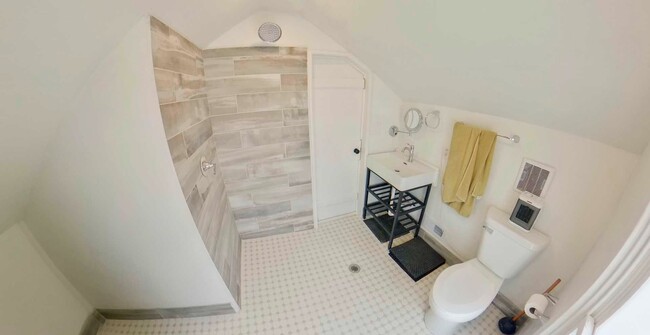 Building Photo - Two Updated Kitchens + Waterfall Shower + ...