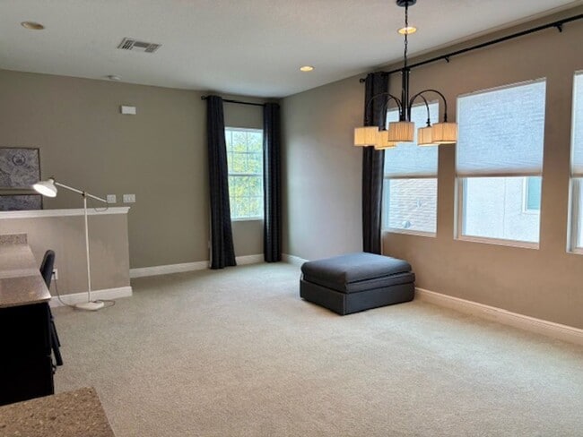 Building Photo - Gorgeous 3-bedroom Model Home in 55+ Commu...