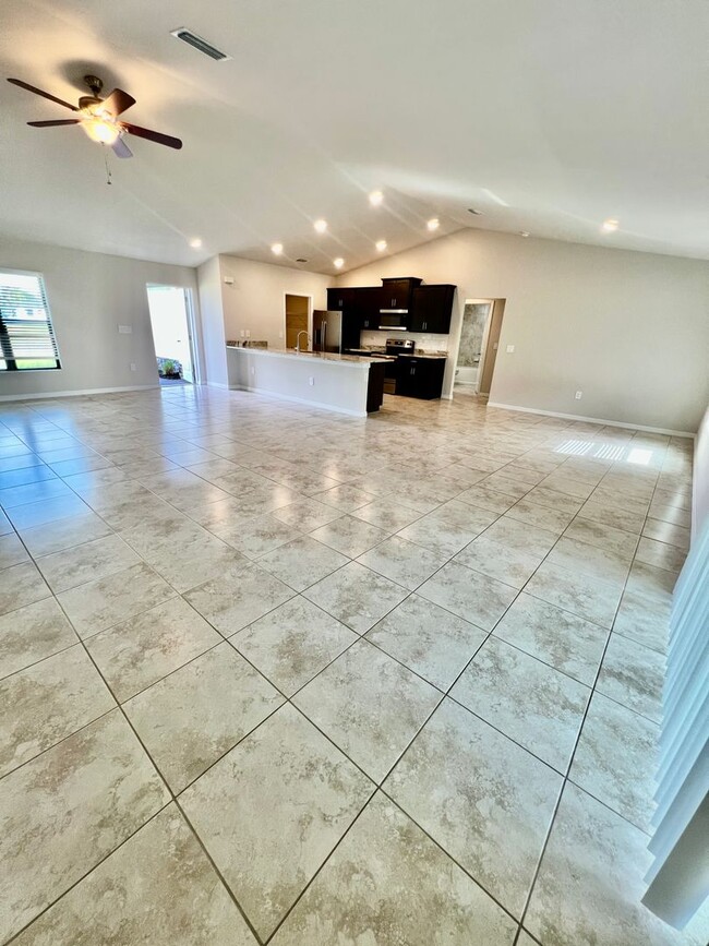 Building Photo - Cape Coral Gem: Stylish 3BR/2BA Home with ...