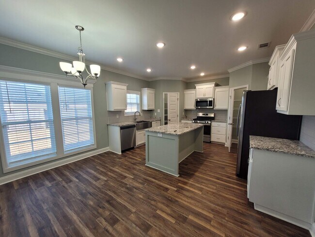 Building Photo - $500 Move-In Incentive - Spacious 4-Bedroo...