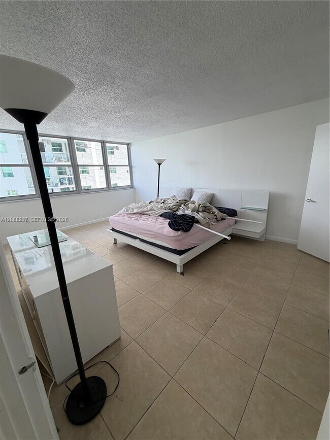Building Photo - 5838 Collins Ave