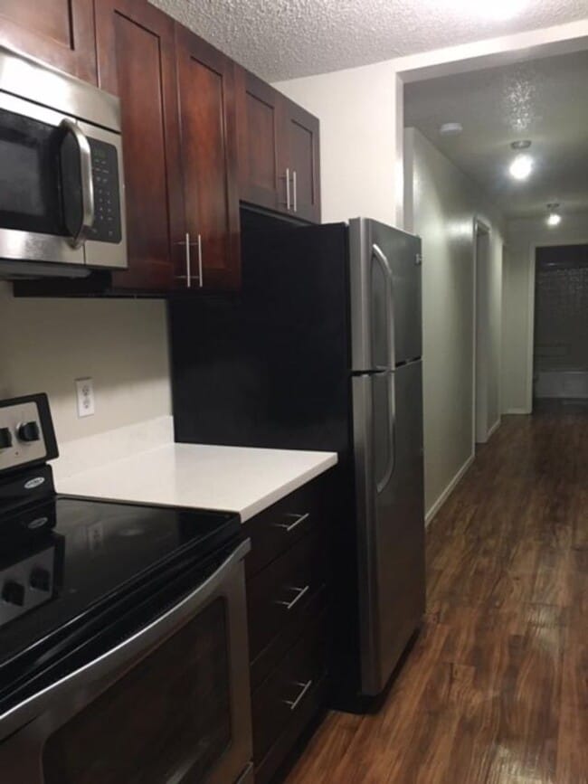 Building Photo - 6511 Apartments