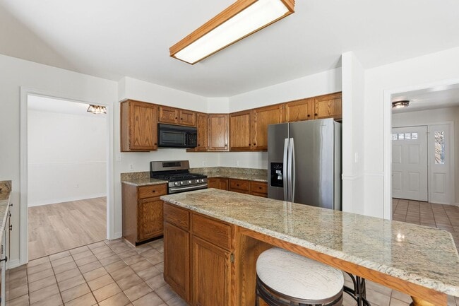 Building Photo - Numerous updates and thoughtful improvements complete this property, making it a rare opportunity...