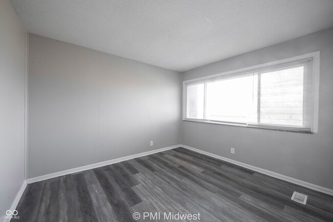 Building Photo - 6060 E 16th St