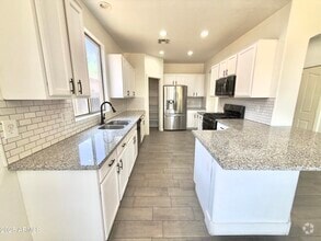 Building Photo - 7116 W Sophie Ln