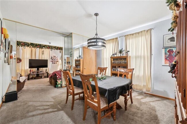 Building Photo - Bright and Roomy 6-Bedroom in McKees Rocks with Garage