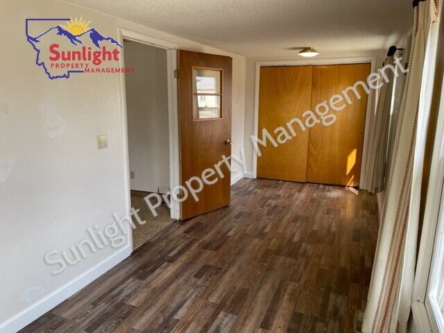Building Photo - "Charming 2-Bed, 2-Bath Retreat in Laurel, MT – Your Perfect 1148 Sq Ft Haven on 5th Ave Awaits!"