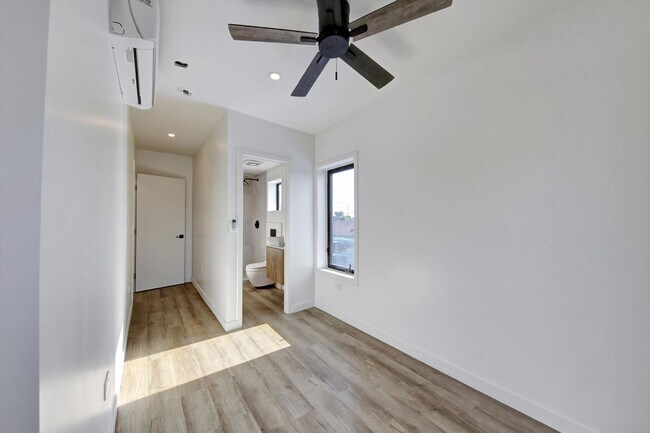 Building Photo - AMAZING NEW CONSTRUCTION UNIT NEAR DOWNTOWN