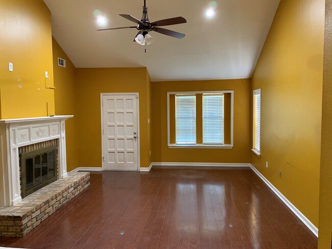 Living room with fireplace - 469 Highland Creek Pkwy