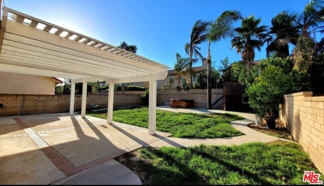 Building Photo - 15180 Carnation St