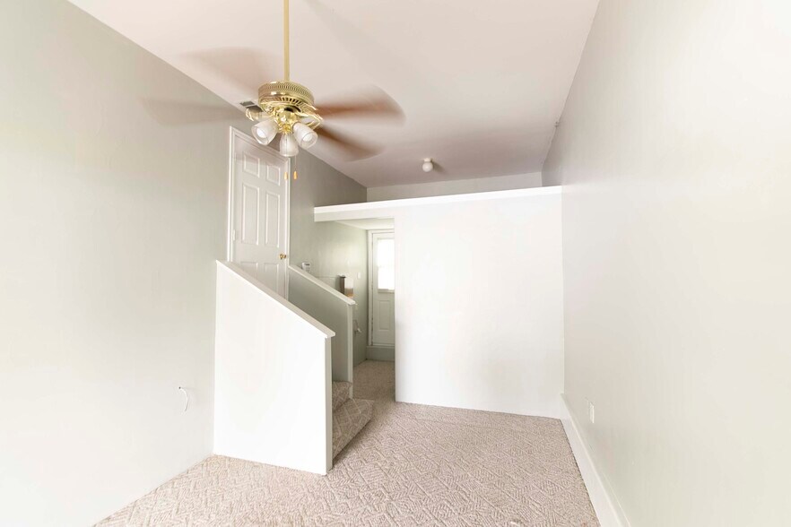 Attached apartment back door and walk-in closet - 7459 Mohawk Ave