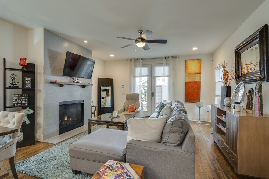 Living Room with Gas Fireplace, Snart Roku tv, large sectional with walk out to private back yard. - 1910 11th Ave N