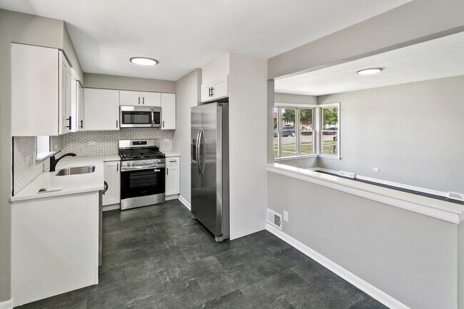 Building Photo - 7704 McVicker Ave