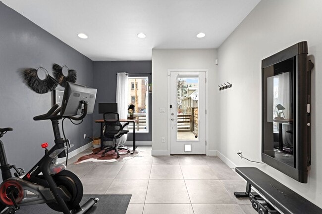 Building Photo - Modern 2-Bedroom Rowhome with Rooftop Moun...