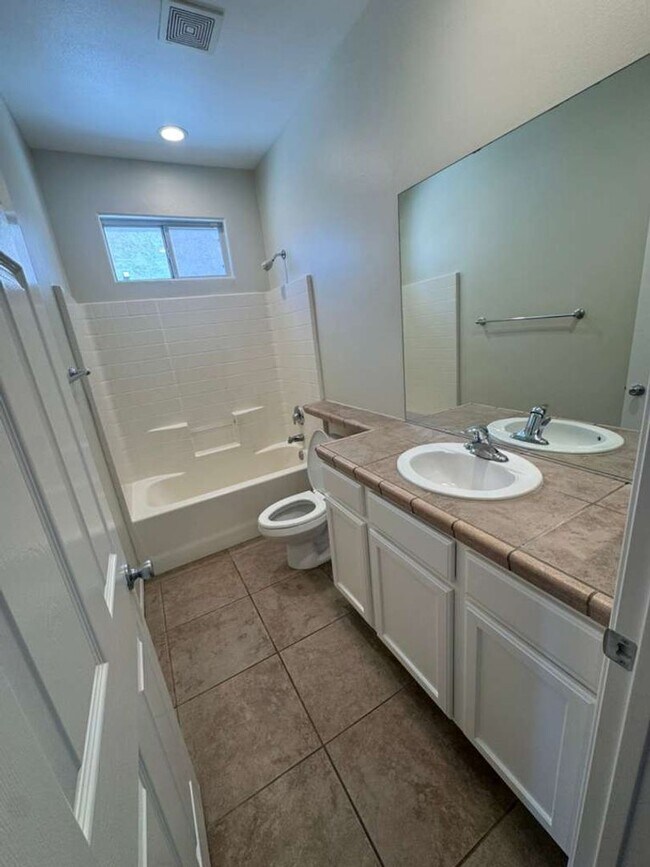 Building Photo - AVAILABLE NOW  4bd/2ba, 1895 Sq. Ft. Single Family Home with Solar