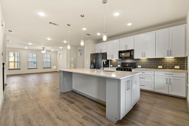 Primary Photo - Spacious 4BR/3.5BA Home with In-Law Suite ...